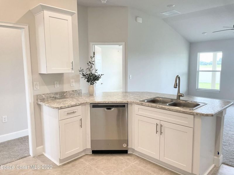 Representative furnished interior of a home built from the 1485 by Adams Homes in Winding Oaks, Weeki Wachee (Image 5). Representative furnished interior of a home built from the 1485 by Adams Homes in Winding Oaks, Weeki Wachee (Image 5).