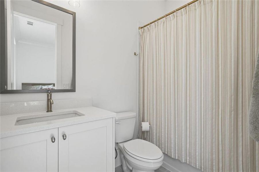Furnished interior view inside a new home in Malone's Pond, Ball Ground (Image 29).