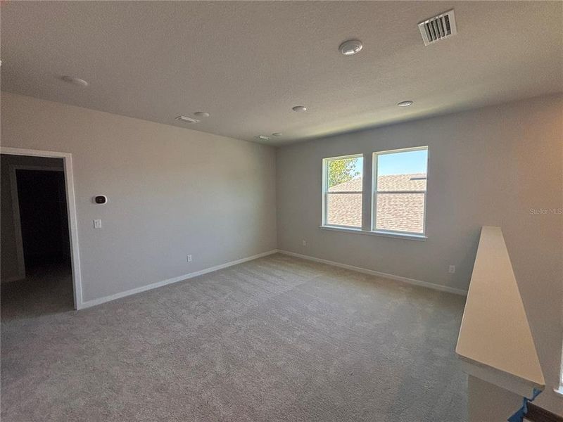Spacious, unfurnished interior of a new home in Reserve East, Flagler Beach (Image 20).