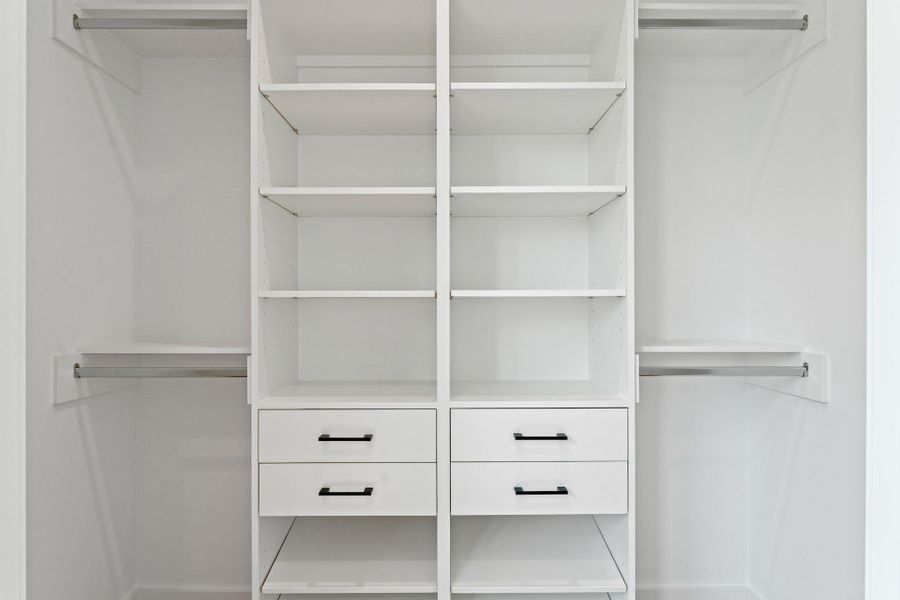 Well-planned shelving ensures even the closets feel custom.