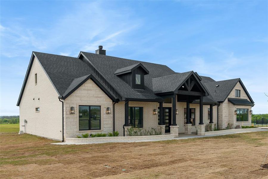 Front exterior of a new home in , Sherman, TX, highlighting curb appeal (Image 23). Front exterior of a new home in , Sherman, TX, highlighting curb appeal (Image 23).