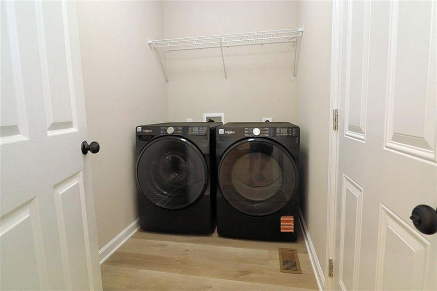 Furnished interior view inside a new home in , Carrollton (Image 5).