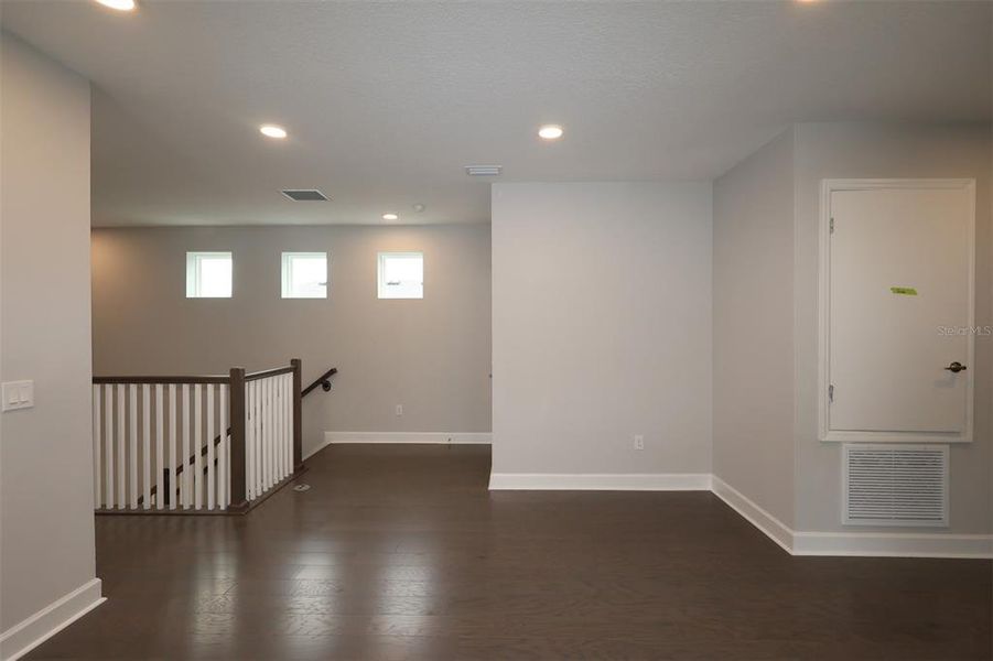 Spacious, unfurnished interior of a new home in Lake Star at Ovation, Winter Garden (Image 15).