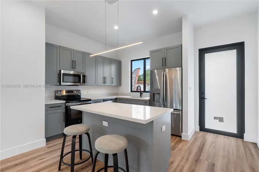 Furnished interior view inside a new home in , Miami (Image 8).