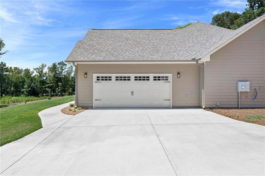 Front exterior of a new home in , Jefferson, GA, highlighting curb appeal (Image 25).