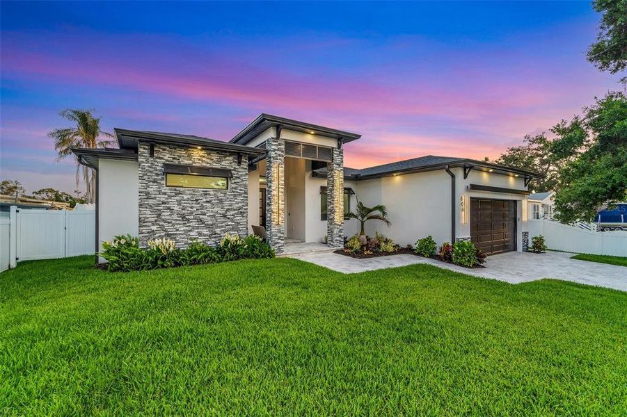 Front exterior of a new home in , Nokomis, FL, highlighting curb appeal (Image 20).