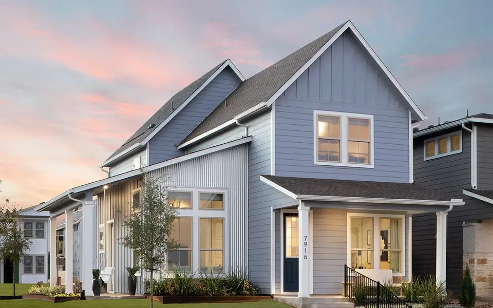 Front exterior of a new home in Easton Park, Austin, TX, highlighting curb appeal (Image 2). Front exterior of a new home in Easton Park, Austin, TX, highlighting curb appeal (Image 2).