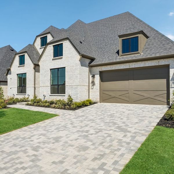 Front exterior of a new home in StarView, Prosper, TX, highlighting curb appeal (Image 28).