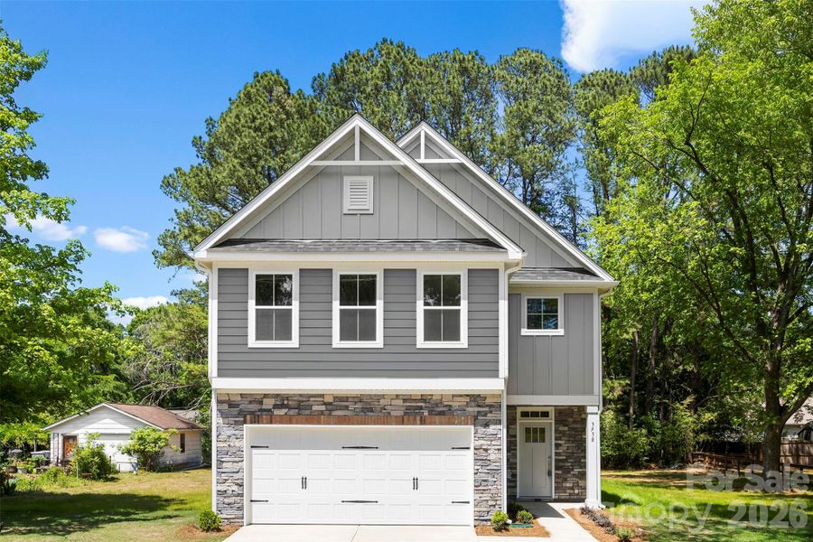 Front exterior of a new home in , Harrisburg, NC, highlighting curb appeal (Image 2). Front exterior of a new home in , Harrisburg, NC, highlighting curb appeal (Image 2).