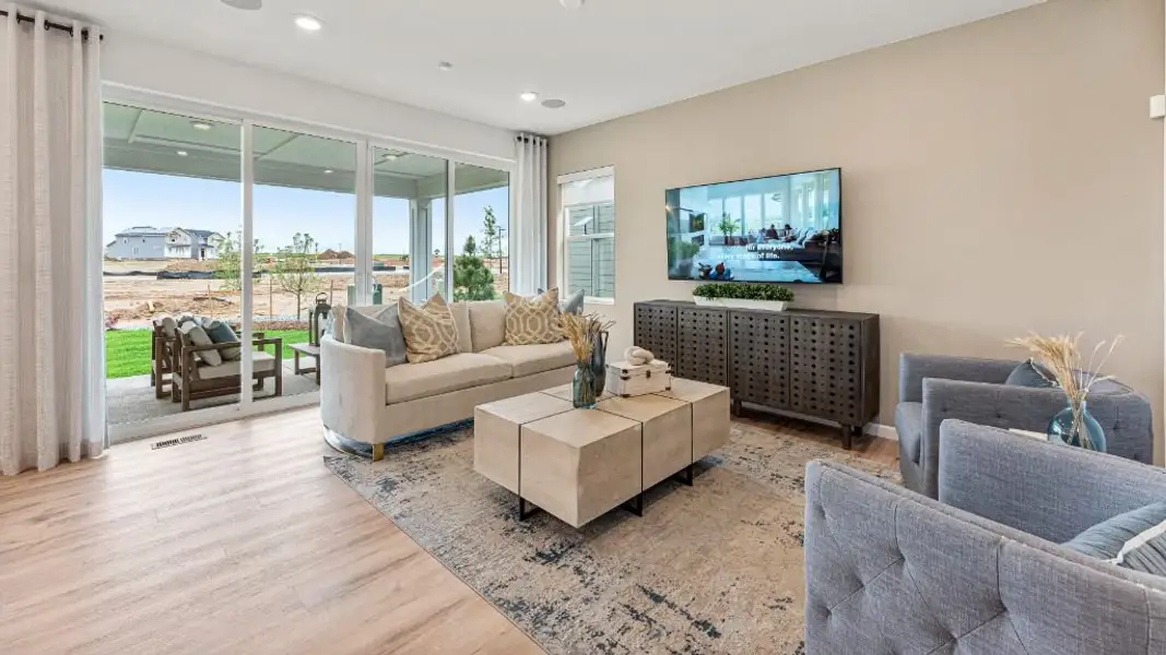 Furnished interior view inside a new home in The Aurora Highlands, Aurora (Image 3).