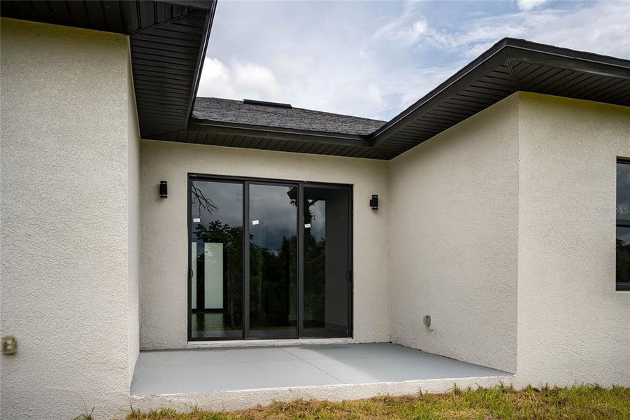 Front exterior of a new home in , Rotonda West, FL, highlighting curb appeal (Image 27).