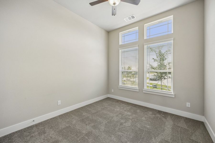 Representative unfurnished interior of a home built from the The Mockingbird by Lillian Custom Homes in Polo Ridge, Forney (Image 19).