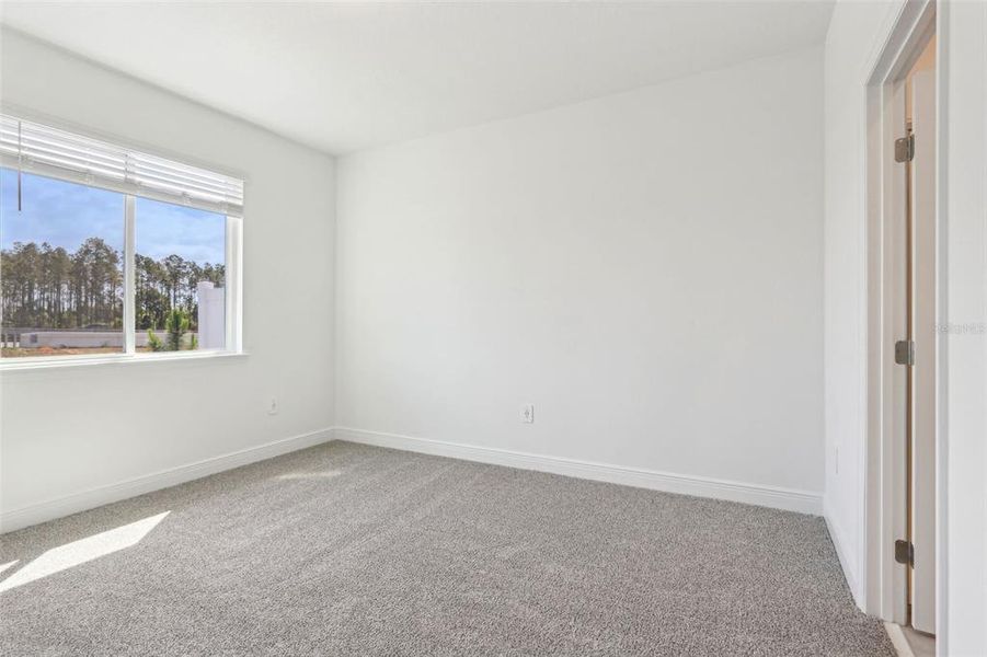 Spacious, unfurnished interior of a new home in Cyrene at Minneola - Villas, Minneola (Image 27).