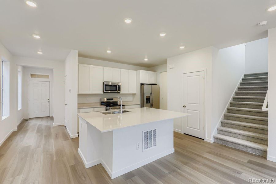 Furnished interior view inside a new home in , Thornton (Image 4).