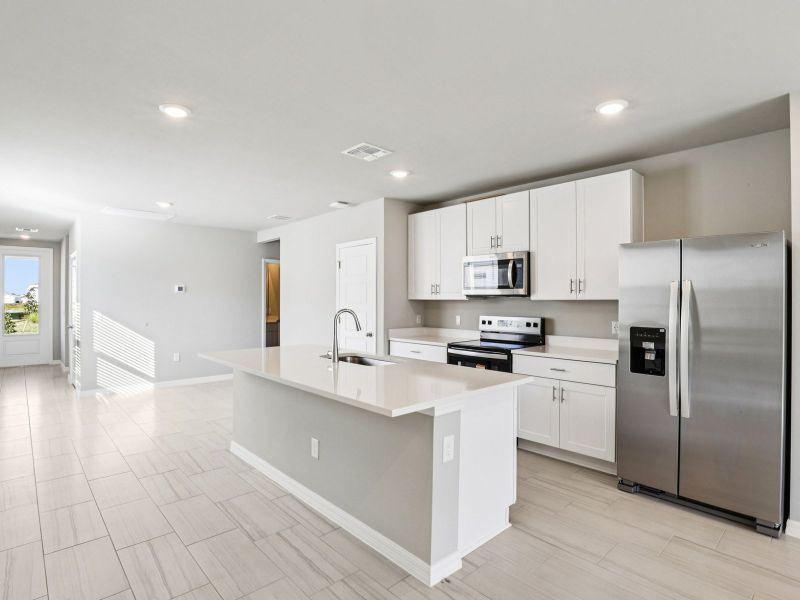 Furnished interior view inside a new home in Crescent Lakes - Premier Series, Punta Gorda (Image 5). Furnished interior view inside a new home in Crescent Lakes - Premier Series, Punta Gorda (Image 5).