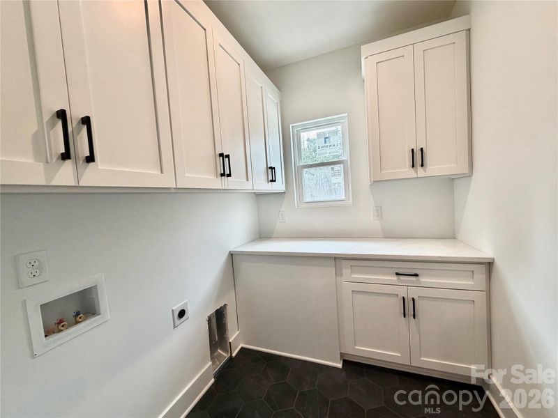 Laundry w/ cabinets Laundry w/ cabinets