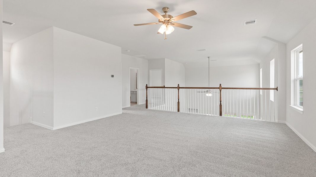 Representative furnished interior of a home built from the Wayfinder by Brightland Homes in Bridgeland Creekland Village, Cypress (Image 14).
