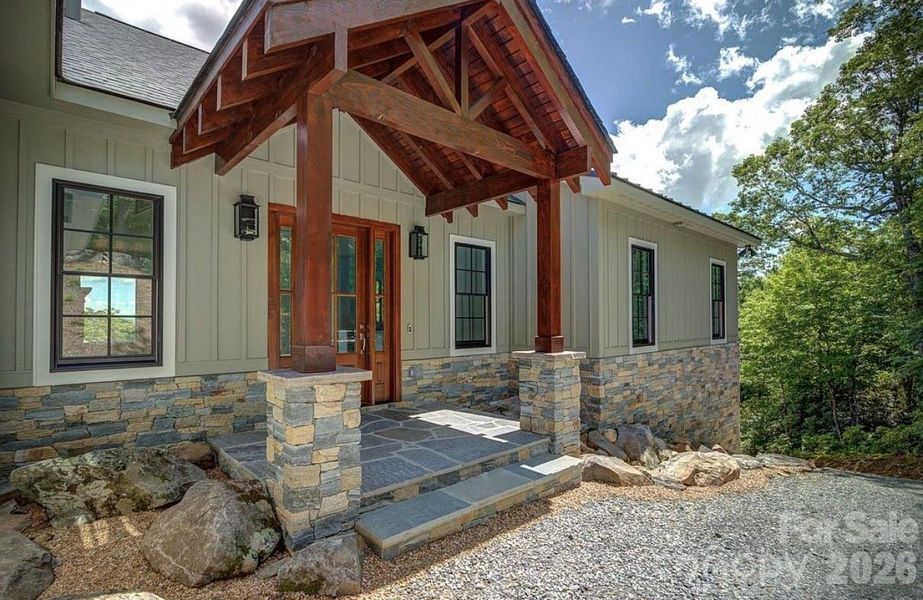 Exterior details and patio area of a home in , Newland (Image 22).