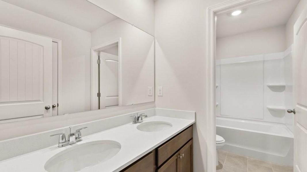 Furnished interior view inside a new home in Falcon Landing, Gainesville (Image 6).