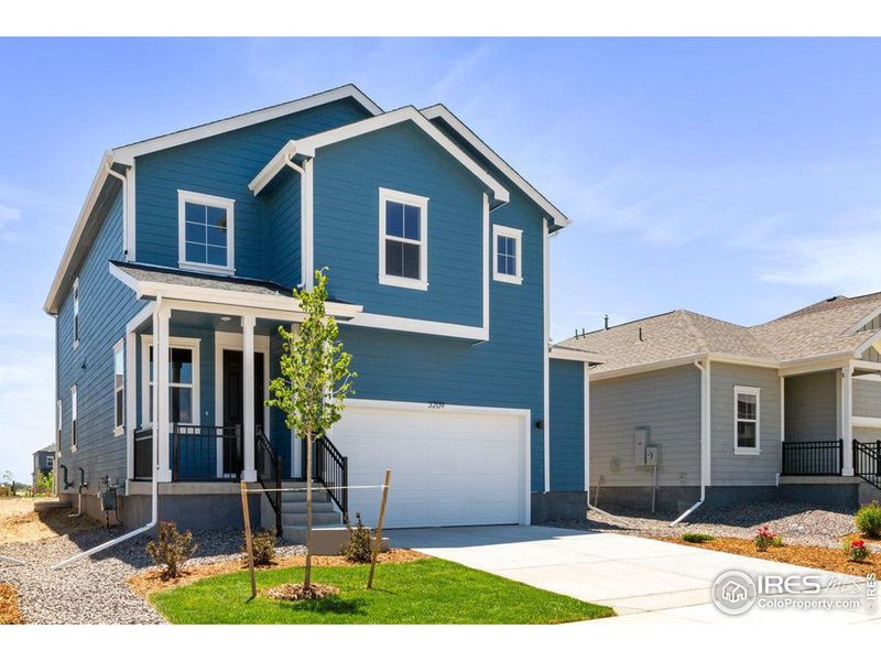 Front exterior of a new home in , Fort Collins, CO, highlighting curb appeal (Image 1).