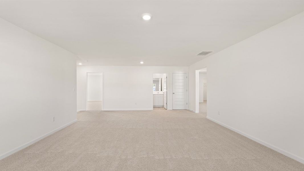 Representative unfurnished interior of a home built from the Mansfield by D.R. Horton in Brooks Station, Dacula (Image 27).