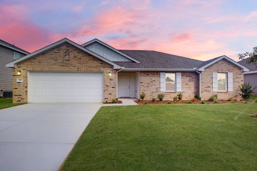 A house with a garage. A house with a garage.