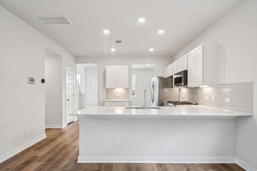 Furnished interior view inside a new home in Avery Centre, Round Rock (Image 7).