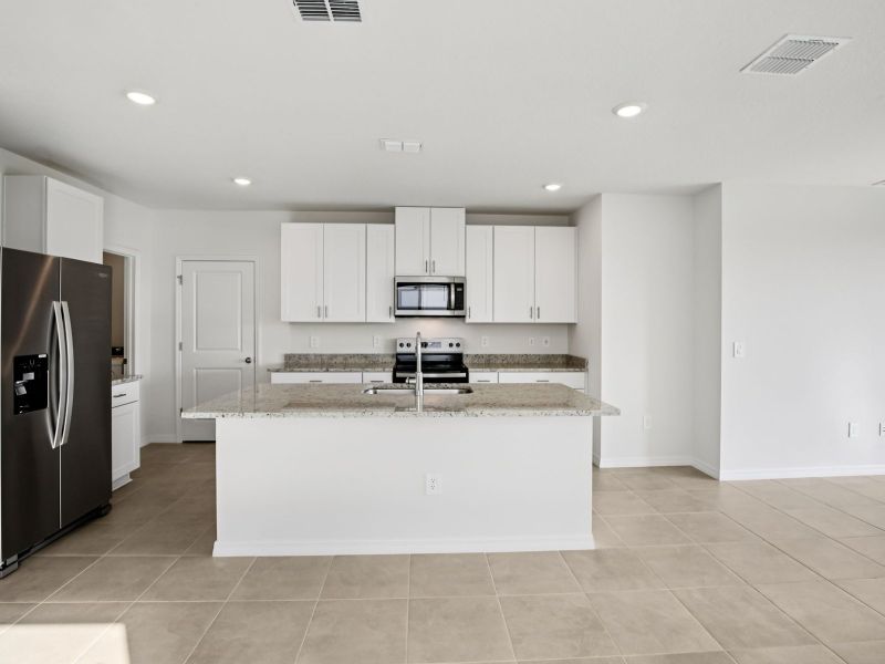 Furnished interior view inside a new home in Oakfield Trails - Premier Series, Parrish (Image 3).