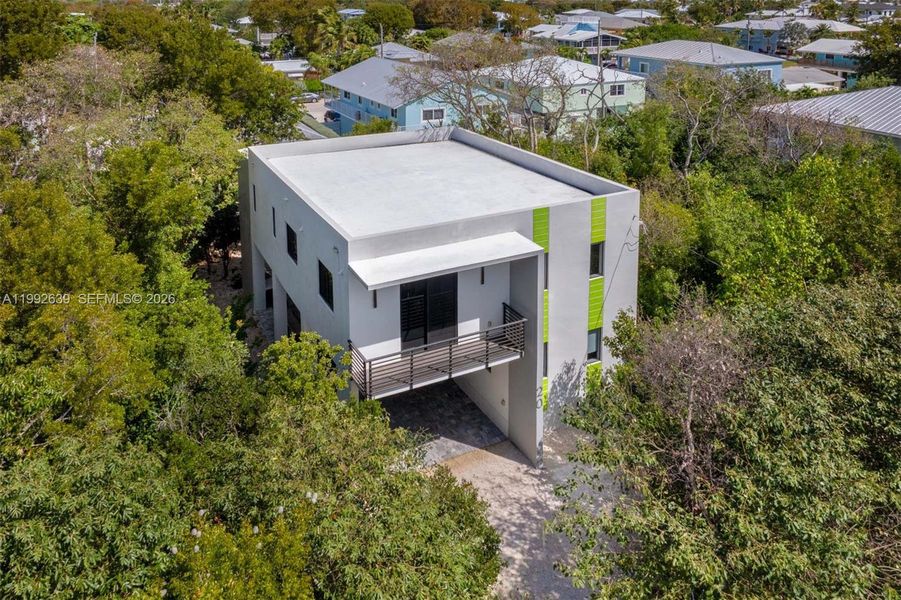 Front exterior of a new home in , Key Largo, FL, highlighting curb appeal (Image 25).