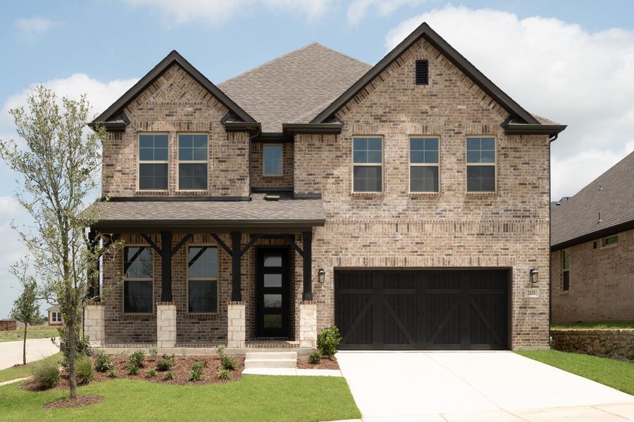 Front exterior of a new home in Enclave at Legacy Hills, Celina, TX, highlighting curb appeal (Image 1). Front exterior of a new home in Enclave at Legacy Hills, Celina, TX, highlighting curb appeal (Image 1).
