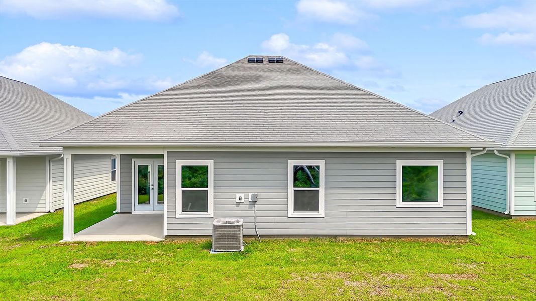 Exterior details and patio area of a home in WindMark Beach, Port Saint Joe (Image 4).