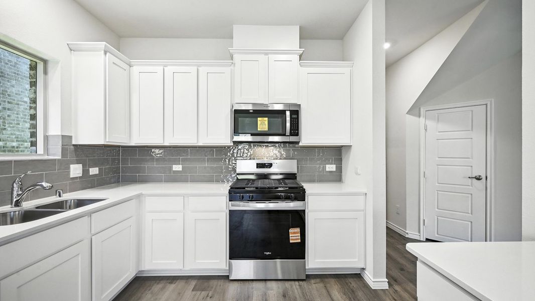 Representative furnished interior of a home built from the Aquamarine by D.R. Horton in The Woods at Lindsey Place, Anna (Image 5).