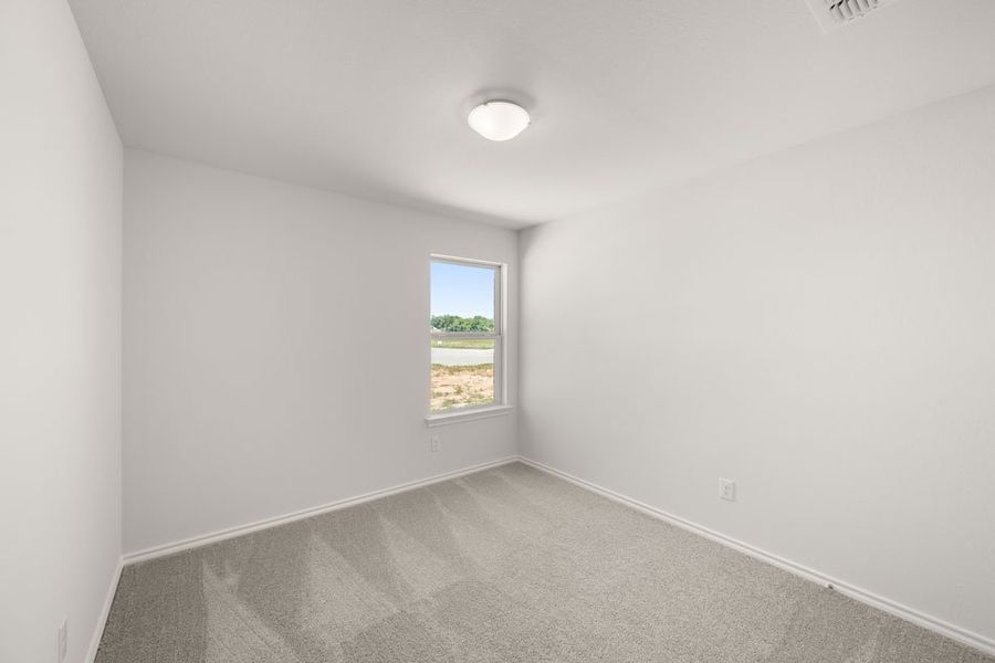 Representative exterior photo of a completed home built from the Austin by Impression Homes in Baker Farms, Cleburne, TX (Image 18).