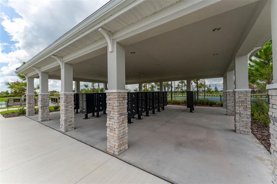 Exterior details and patio area of a home in Prosperity Lakes Active Adult, Parrish (Image 31).
