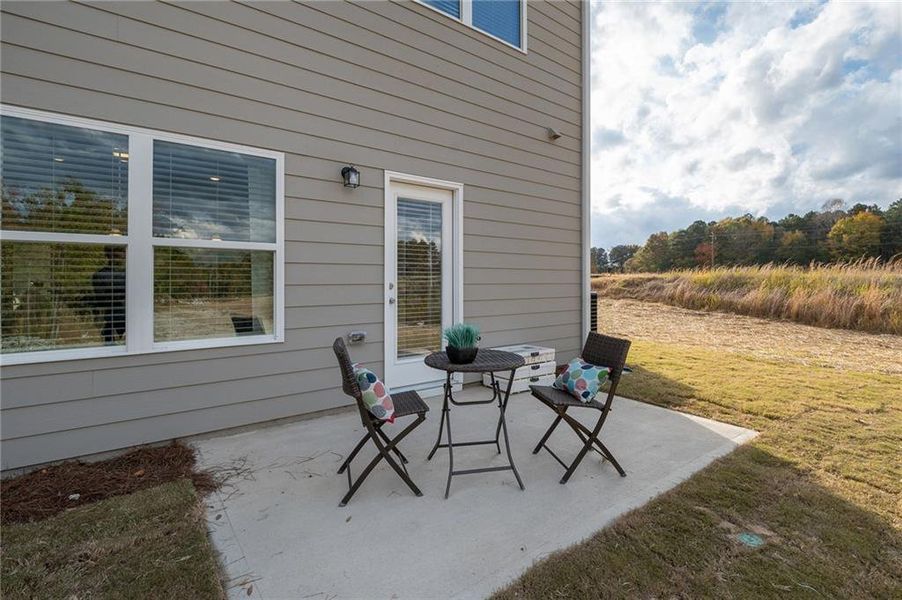 Exterior details and patio area of a home in Creekside Village, Lithonia (Image 25).
