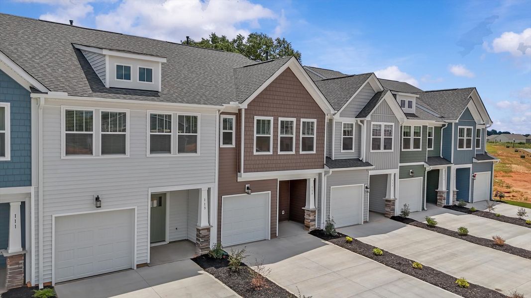 Front exterior of a new home in Saluda Crossing, Piedmont, SC, highlighting curb appeal (Image 2).