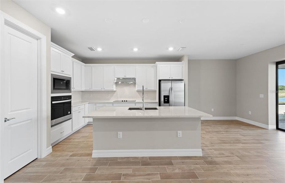Furnished interior view inside a new home in The Strand at Cedar Grove, North Port (Image 6).