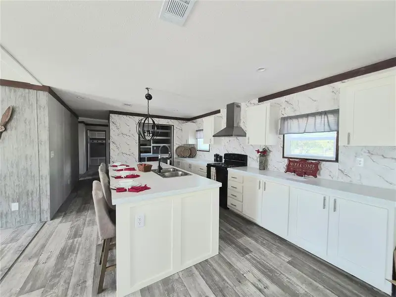 Furnished interior view inside a new home in , Brooksville (Image 9).