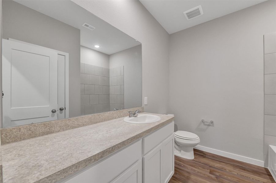 Furnished interior view inside a new home in Barrett Crossing, Crosby (Image 11).