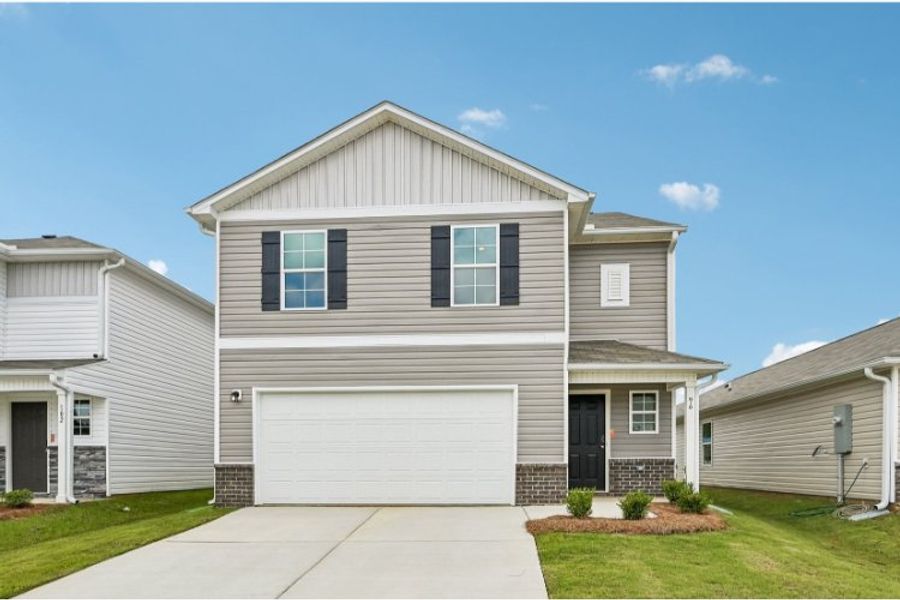 Front exterior of a new home in , Royse City, TX, highlighting curb appeal (Image 1). Front exterior of a new home in , Royse City, TX, highlighting curb appeal (Image 1).
