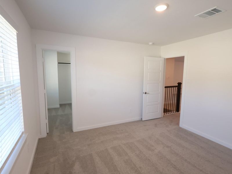 Spacious, unfurnished interior of a new home in Sorella, Tomball (Image 13).