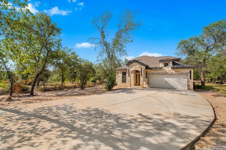 Front exterior of a new home in , San Antonio, TX, highlighting curb appeal (Image 20). Front exterior of a new home in , San Antonio, TX, highlighting curb appeal (Image 20).