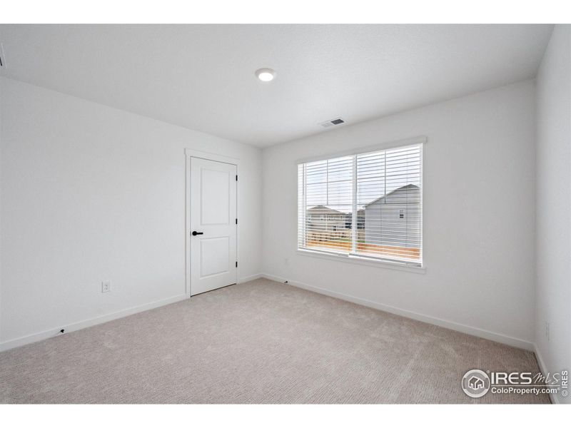 Spacious, unfurnished interior of a new home in Hansen Farm, Fort Collins (Image 36).