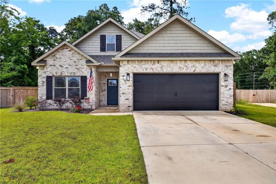 Front exterior of a new home in , Kathleen, GA, highlighting curb appeal (Image 2). Front exterior of a new home in , Kathleen, GA, highlighting curb appeal (Image 2).
