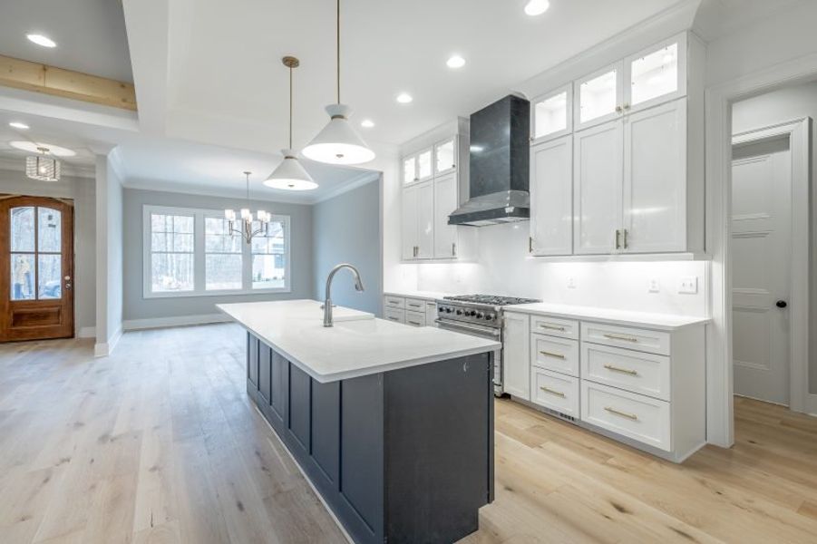 Representative furnished interior of a home built from the Carolina A by Riverstone Construction, LLC in Jasper Highlands, Guild (Image 17).
