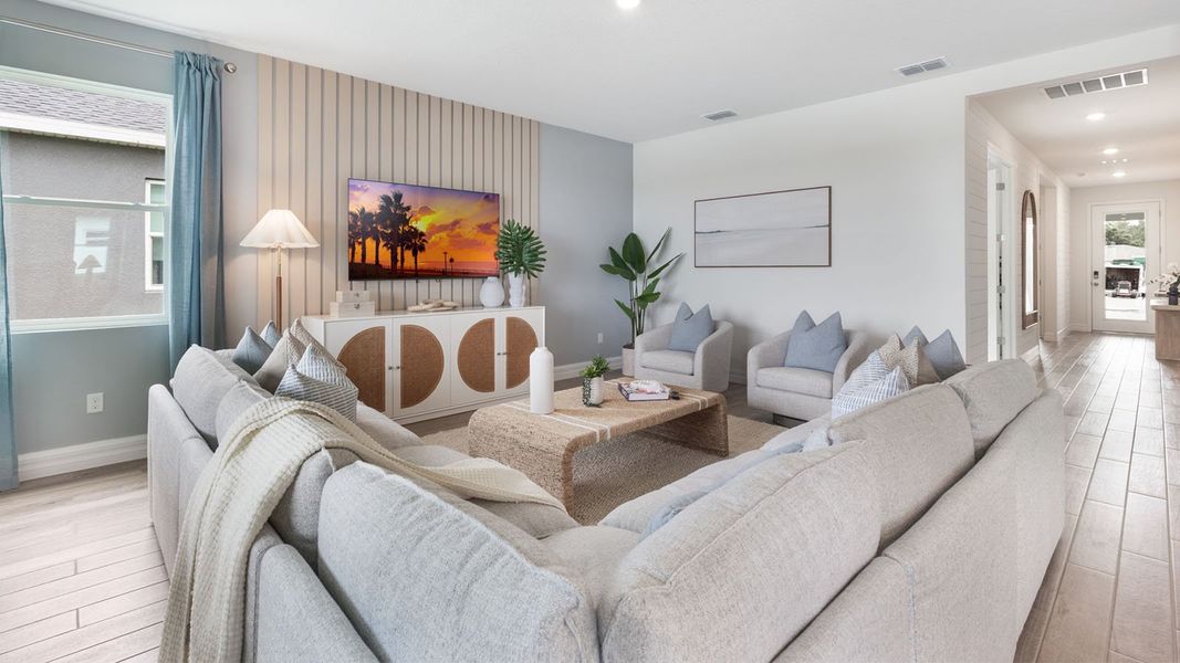 Representative furnished interior of a home built from the DENHAM by D.R. Horton in Lakes of Mount Dora, Mount Dora (Image 5).