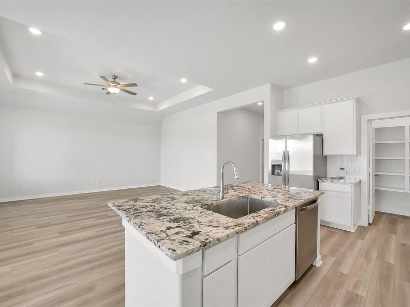Furnished interior view inside a new home in Sunterra, Katy (Image 10).