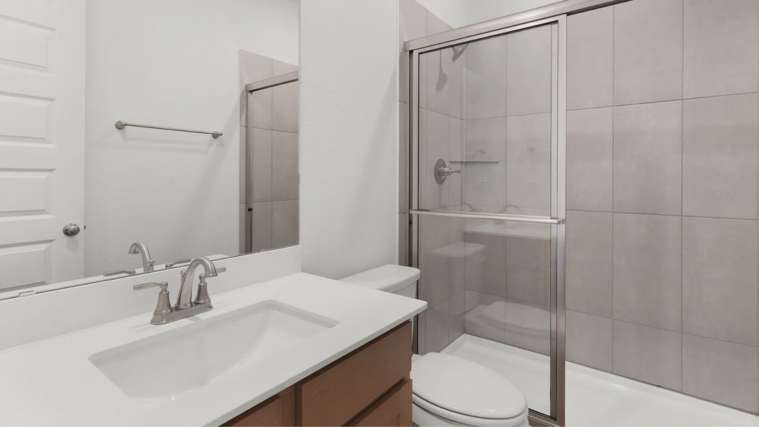 Representative furnished interior of a home built from the Bryson by Chesmar Homes in Newhaven, Manor (Image 4).