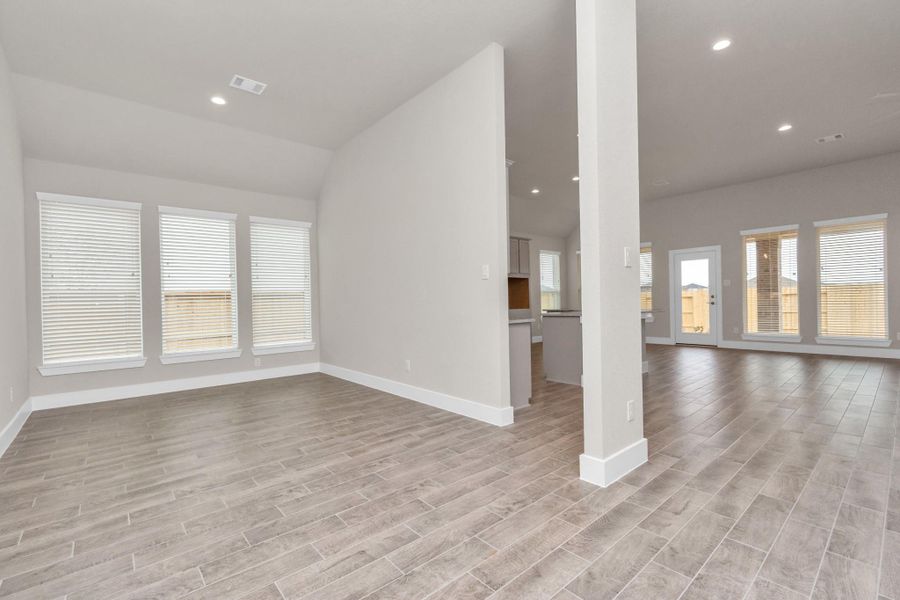 Create lasting memories with your family and friends at the dining table in this expansive dining room. Showcases sophisticated flooring, custom paint, and seamlessly connects to the family room and kitchen, providing an open and inviting atmosphere. Sample photo of completed home with similar floor plan. Actual colors and selections may vary. Create lasting memories with your family and friends at the dining table in this expansive dining room. Showcases sophisticated flooring, custom paint, and seamlessly connects to the family room and kitchen, providing an open and inviting atmosphere. Sample photo of completed home with similar floor plan. Actual colors and selections may vary.