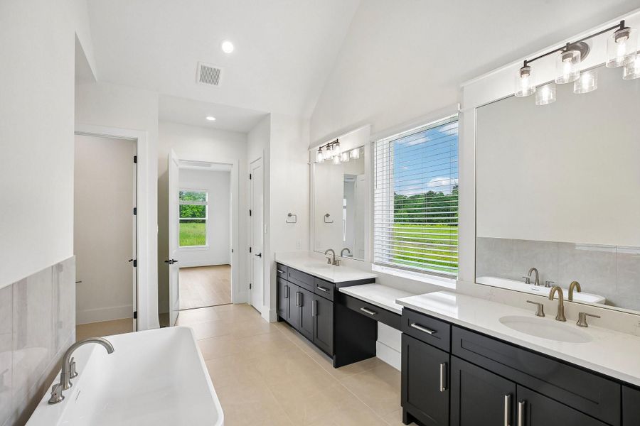 Furnished interior view inside a new home in Homestead Hill, New Waverly (Image 7).